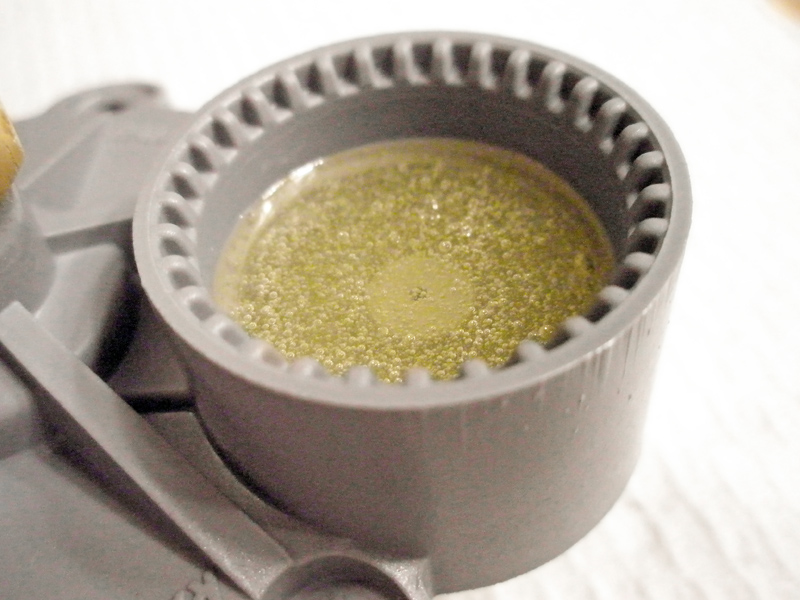 Fill solenoid chamber with epoxy
